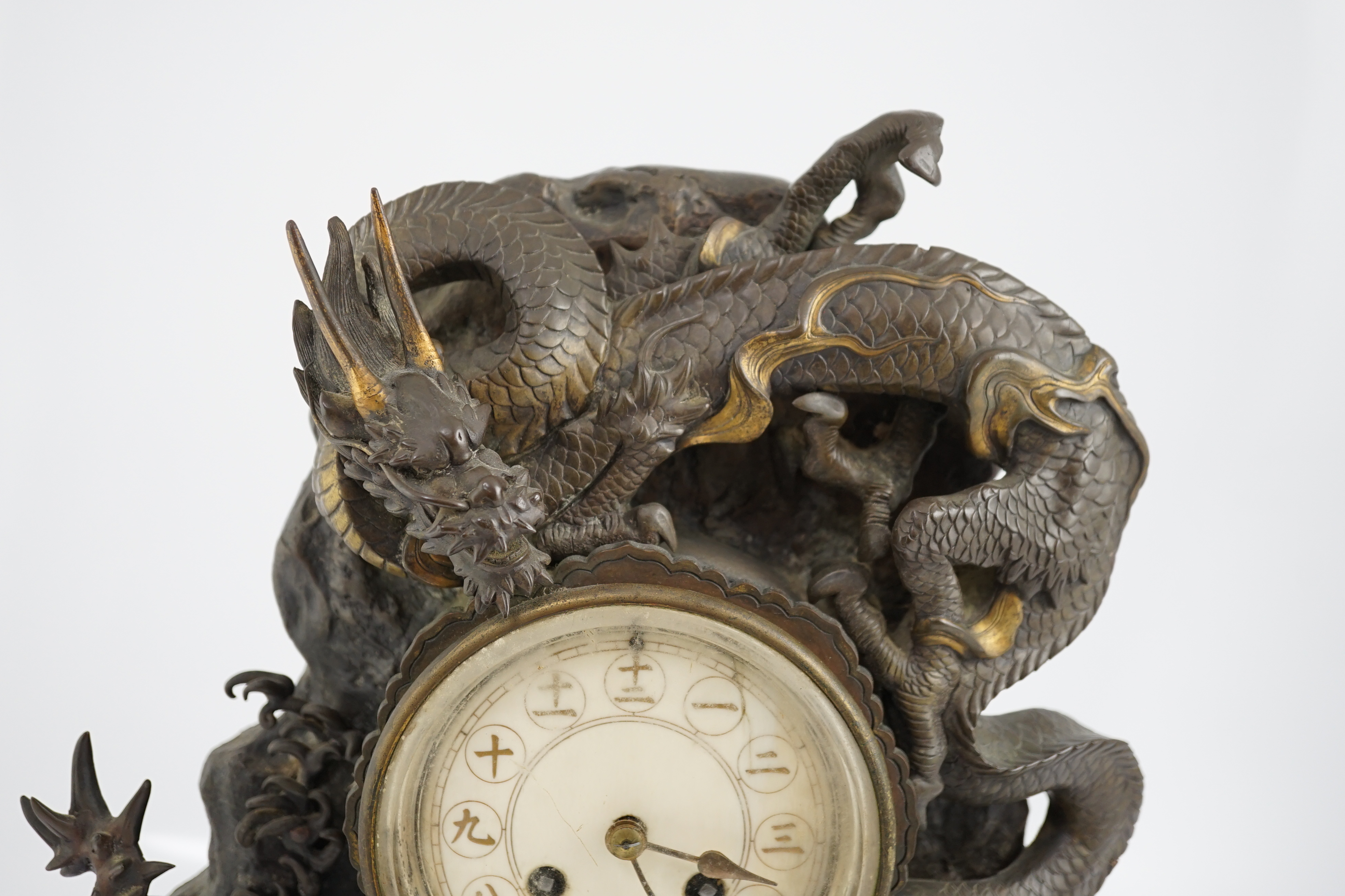 A Japanese parcel gilt bronze ‘dragon’ mantel clock, Meiji period, CITES submission reference:WX9VSMU6